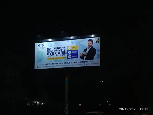 Centre for Sight eye-care billboard lit at night