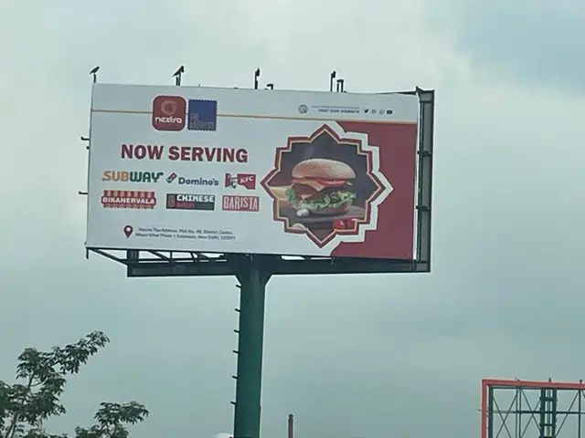 Food-court billboard for Subway and partner brands
